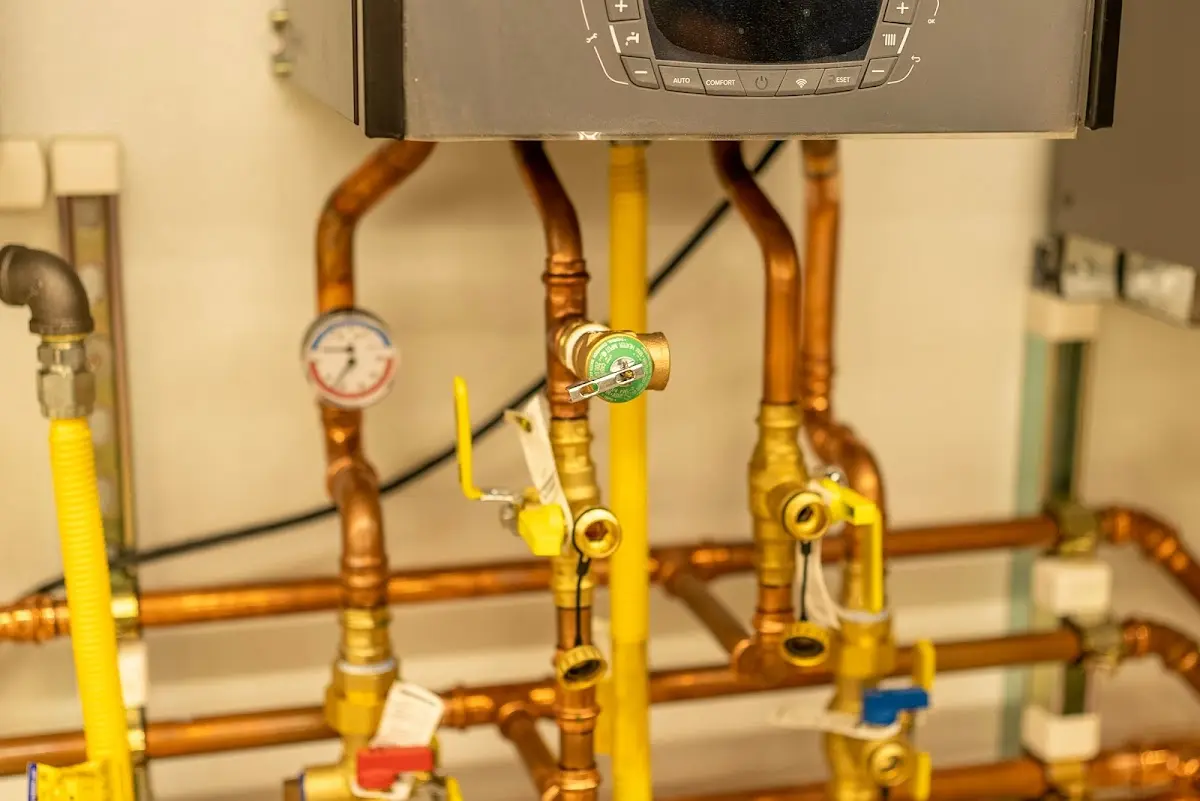 Licensed technician providing Backflow Prevention for a homeowner in East Grand Rapids